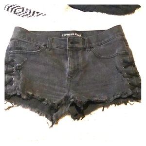 Black, ripped shorts